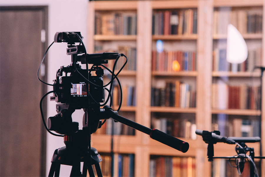 A video camera is filming an event during the Night of Science.